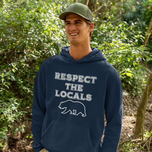Introducing our rugged and stylish camping hoodie featuring a majestic bear design and the iconic phrase "Respect The Locals."
