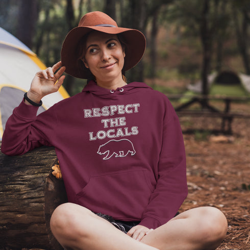 Introducing our rugged and stylish camping hoodie featuring a majestic bear design and the iconic phrase "Respect The Locals."