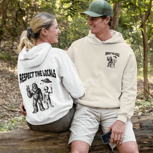 The Respect the Locals Hoodie features this dynamic duo (Big Foot & Alien) striking a pose like they’re on the cover of Paranormal Weekly
