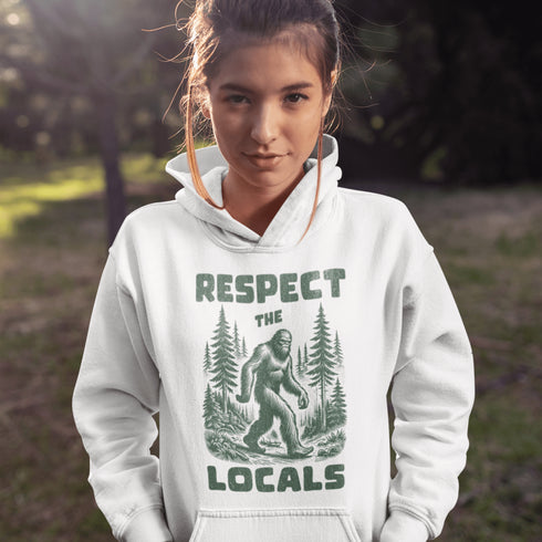 Our Respect the Locals Hoodie features the elusive forest king himself, casually minding his business among the trees with the message: “Respect the Locals.”