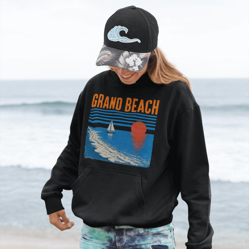 Bring the beauty of beachside sunsets wherever you go with our Grand Beach, Manitoba hoodie.