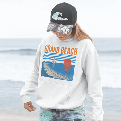 Bring the beauty of beachside sunsets wherever you go with our Grand Beach, Manitoba hoodie.