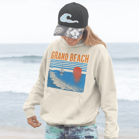 Bring the beauty of beachside sunsets wherever you go with our Grand Beach, Manitoba hoodie.