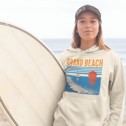 Bring the beauty of beachside sunsets wherever you go with our Grand Beach, Manitoba hoodie.