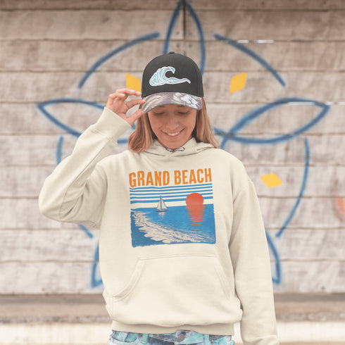 Bring the beauty of beachside sunsets wherever you go with our Grand Beach, Manitoba hoodie.