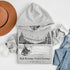 Cozy outdoor hockey hoodie featuring a glowing rink graphic and prairie winter vibe. Perfect for skating, cabin nights, and cold-weather comfort.
