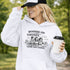 Soccer mom hoodie with “Running on Coffee and Game Day Chaos” design featuring moms cheering on the sidelines with kids playing soccer in the background
