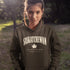 Saskatchewan Land of Living Skies unisex hoodie with vintage collegiate lettering and maple leaf graphic by Prairie Life Co.
