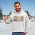 Small Town Big Hockey Dreams Hoodie – nostalgic pond hockey sweatshirt with campfire winter scene. Cozy unisex fit. Multiple colors available.