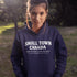 Cozy Small Town Canada hockey hoodie inspired by outdoor rink life. Warm fleece sweatshirt perfect for winter skating and small-town pride.