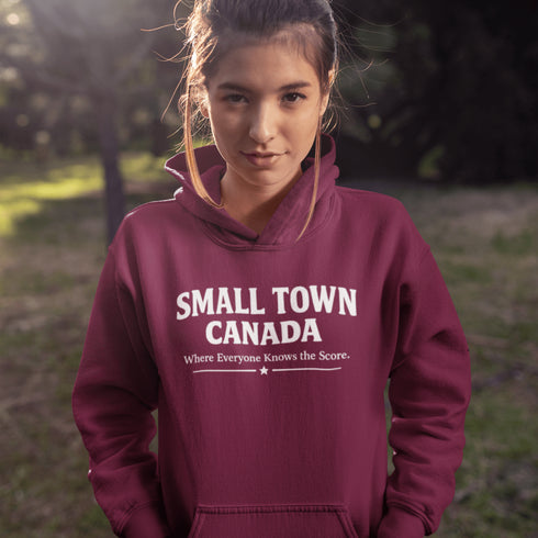 Cozy Small Town Canada hockey hoodie inspired by outdoor rink life. Warm fleece sweatshirt perfect for winter skating and small-town pride.