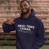 Cozy Small Town Canada hockey hoodie inspired by outdoor rink life. Warm fleece sweatshirt perfect for winter skating and small-town pride.