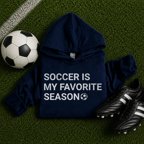 Navy blue “Soccer Is My Favorite Season” hoodie with white text, casual soccer apparel