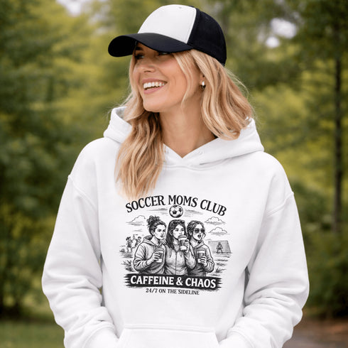 Soccer moms hoodie with “Soccer Moms Club Caffeine and Chaos” design featuring moms holding coffee cups and watching kids play soccer in the background
