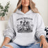 Soccer moms hoodie with “Soccer Moms Club Caffeine and Chaos” design featuring moms holding coffee cups and watching kids play soccer in the background