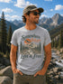 Unisex hiking shirt with mountain landscape graphic in outdoor setting