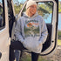 Vintage mountain adventure hoodie featuring a scenic outdoor landscape graphic on a Gildan 18500 Heavy Blend hoodie, shown in a lifestyle mockup. Available in multiple colors with a relaxed unisex fit.