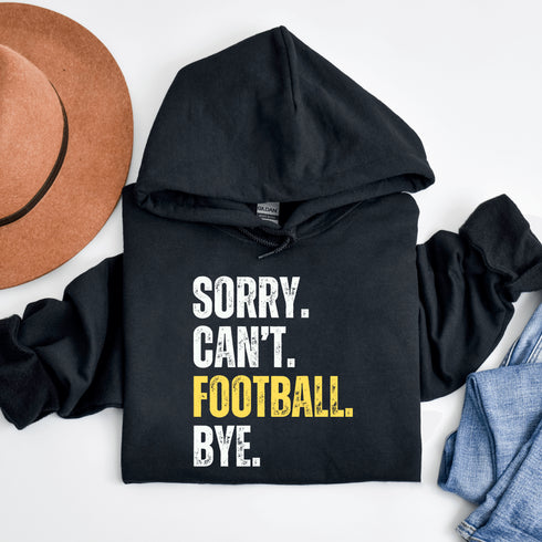 Introducing the "Sorry, Can’t, Football, Bye" Hoodie – because who has time for plans when there's a game on? Whether it’s a family dinner, your friend's birthday, or any non-football-related activity, this hoodie is your polite way of saying, "Not today, people."