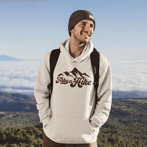 Introducing our rugged and stylish hiking hoodie, perfect for outdoor enthusiasts and nature lovers alike. Featuring a striking mountain graphic and the motivational slogan "Take A Hike", this sweater is designed to inspire your next camping adventure.