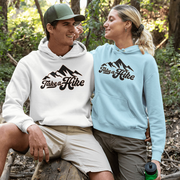 Introducing our rugged and stylish hiking hoodie, perfect for outdoor enthusiasts and nature lovers alike. Featuring a striking mountain graphic and the motivational slogan "Take A Hike", this sweater is designed to inspire your next camping adventure.