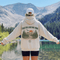 Vintage-inspired outdoor hoodie featuring a matching left chest graphic and large back graphic, displayed in a lifestyle mockup inspired by hiking, camping, scenic mountain roads, and outdoor adventures.