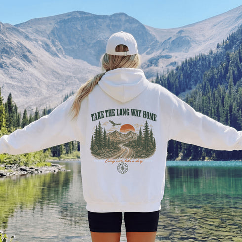 Vintage-inspired outdoor hoodie featuring a matching left chest graphic and large back graphic, displayed in a lifestyle mockup inspired by hiking, camping, scenic mountain roads, and outdoor adventures.