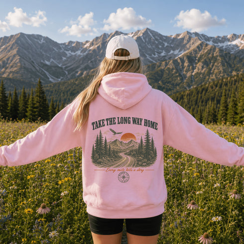 Vintage-inspired outdoor hoodie featuring a matching left chest graphic and large back graphic, displayed in a lifestyle mockup inspired by hiking, camping, scenic mountain roads, and outdoor adventures.