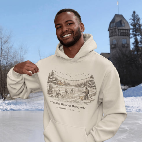 The Rink Was Our Backyard Hoodie – nostalgic outdoor hockey sweatshirt inspired by backyard rink memories. Unisex fit. Multiple colors available.