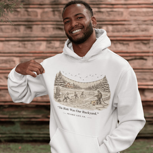 The Rink Was Our Backyard Hoodie – nostalgic outdoor hockey sweatshirt inspired by backyard rink memories. Unisex fit. Multiple colors available.
