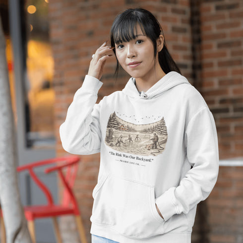 The Rink Was Our Backyard Hoodie – nostalgic outdoor hockey sweatshirt inspired by backyard rink memories. Unisex fit. Multiple colors available.