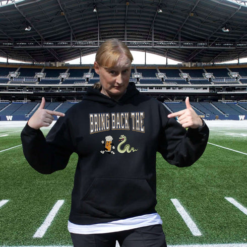 Introducing the "Bring Back The Beer Snake" Hoodie – the ultimate conversation starter (and possibly friendship saver) for every die-hard Winnipeg Bomber fan! This cozy, stylish hoodie features a hilarious graphic of a beer running away from a mischievous snake, perfectly capturing the epic saga of the legendary beer snake.