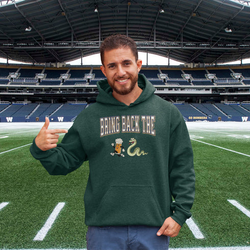 Introducing the "Bring Back The Beer Snake" Hoodie – the ultimate conversation starter (and possibly friendship saver) for every die-hard Winnipeg Bomber fan! This cozy, stylish hoodie features a hilarious graphic of a beer running away from a mischievous snake, perfectly capturing the epic saga of the legendary beer snake.