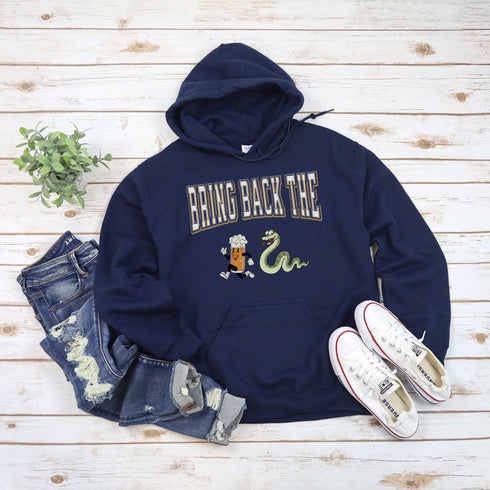 Introducing the "Bring Back The Beer Snake" Hoodie – the ultimate conversation starter (and possibly friendship saver) for every die-hard Winnipeg Bomber fan! This cozy, stylish hoodie features a hilarious graphic of a beer running away from a mischievous snake, perfectly capturing the epic saga of the legendary beer snake.