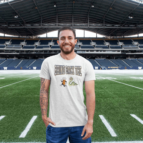 Introducing the "Bring Back The Beer Snake" T-shirt – the ultimate conversation starter (and possibly friendship saver) for every die-hard Winnipeg Bomber fan! This soft, stylish tee features a hilarious graphic of a beer running away from a mischievous snake, perfectly capturing the epic saga of the legendary beer snake.