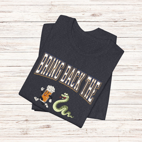 Introducing the "Bring Back The Beer Snake" T-shirt – the ultimate conversation starter (and possibly friendship saver) for every die-hard Winnipeg Bomber fan! This soft, stylish tee features a hilarious graphic of a beer running away from a mischievous snake, perfectly capturing the epic saga of the legendary beer snake.