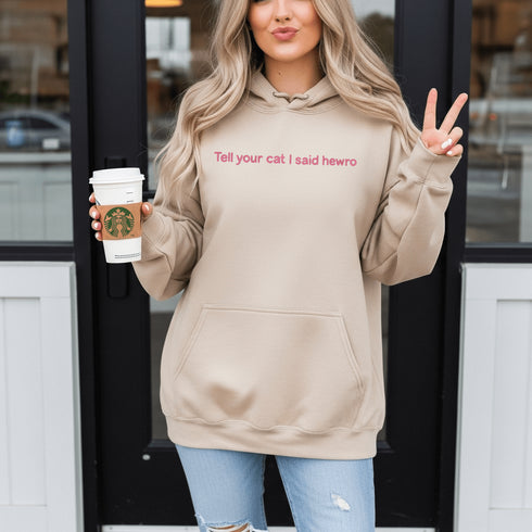 This adorable hoodie is the ultimate conversation starter—especially with cat people who understand the importance of a proper feline greeting (yes, “hewro” counts as proper).