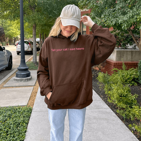 This adorable hoodie is the ultimate conversation starter—especially with cat people who understand the importance of a proper feline greeting (yes, “hewro” counts as proper).