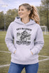 Funny soccer hoodie design showing two kids riding a bike to soccer practice with the phrase get in loser we’re late for soccer practice
