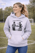 Funny soccer hoodie with “Classy Until Kickoff” text and illustration of woman yelling at referee on soccer field
