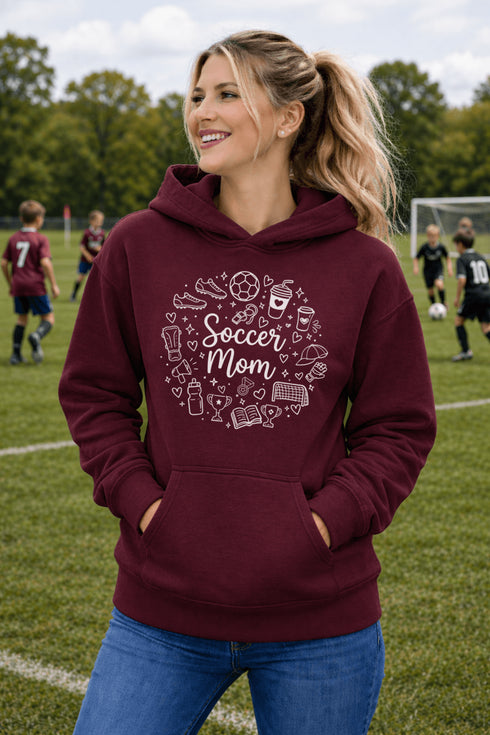 Soccer mom hoodie with playful sports-themed icons design, cozy sweatshirt for game day moms, casual athletic mom apparel
