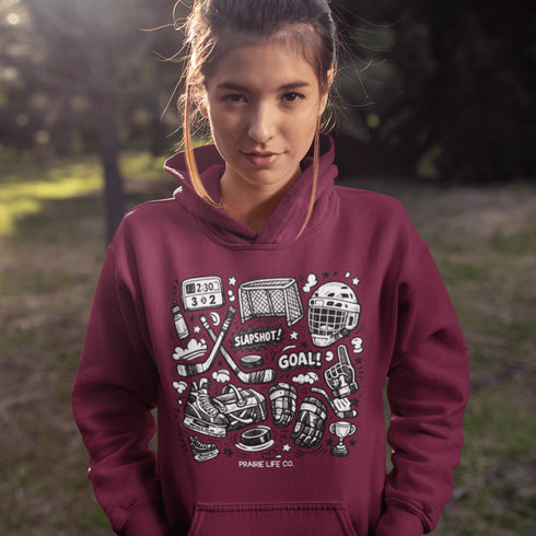 Celebrate your love of the game with this Vintage Hockey Doodle Hoodie featuring hockey sticks, skates, gloves, helmet, goal net and puck graphics. A cozy hoodie for hockey lovers, players, and hockey moms.