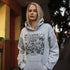 Celebrate your love of the game with this Vintage Hockey Doodle Hoodie featuring hockey sticks, skates, gloves, helmet, goal net and puck graphics. A cozy hoodie for hockey lovers, players, and hockey moms.