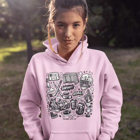 Celebrate your love of the game with this Vintage Hockey Doodle Hoodie featuring hockey sticks, skates, gloves, helmet, goal net and puck graphics. A cozy hoodie for hockey lovers, players, and hockey moms.