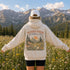 Vintage mountain and wildflower graphic hoodie featuring a matching left chest design and oversized back print on a unisex Gildan 18500 Heavy Blend hoodie available in multiple colors. Perfect for hiking, camping, outdoor adventures, and everyday wear.