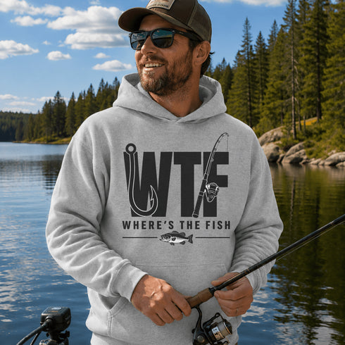 Unisex heavy blend hoodie featuring a humorous fishing graphic with hook and rod artwork displayed in a variety of outdoor lifestyle mockups and fishing-themed settings.