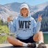 Unisex heavy blend hoodie featuring a humorous fishing graphic with hook and rod artwork displayed in a variety of outdoor lifestyle mockups and fishing-themed settings.
