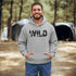Step into the wild with our unique camping hoodie, featuring a captivating camping scene intricately etched inside the words "Into The Wild". Crafted for outdoor enthusiasts, this hoodie is not just a piece of clothing but a symbol of adventure and exploration.
