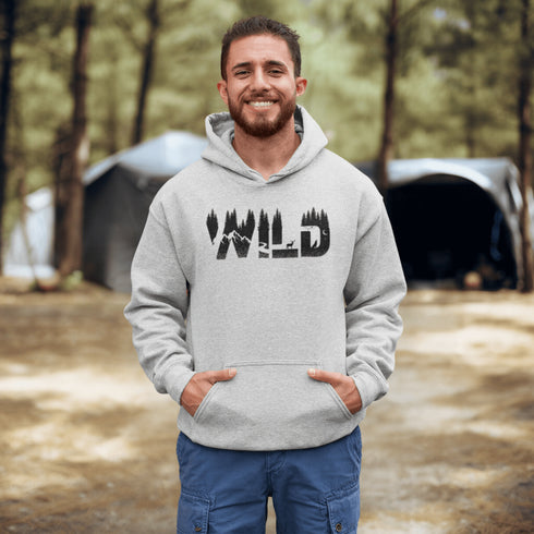 Step into the wild with our unique camping hoodie, featuring a captivating camping scene intricately etched inside the words "Into The Wild". Crafted for outdoor enthusiasts, this hoodie is not just a piece of clothing but a symbol of adventure and exploration.