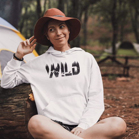 Step into the wild with our unique camping hoodie, featuring a captivating camping scene intricately etched inside the words "Into The Wild". Crafted for outdoor enthusiasts, this hoodie is not just a piece of clothing but a symbol of adventure and exploration.