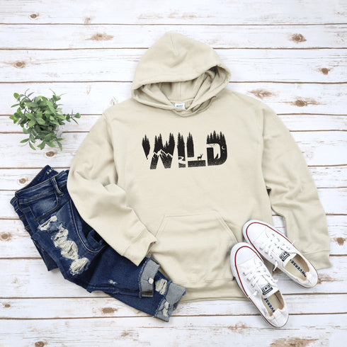 Step into the wild with our unique camping hoodie, featuring a captivating camping scene intricately etched inside the words "Into The Wild". Crafted for outdoor enthusiasts, this hoodie is not just a piece of clothing but a symbol of adventure and exploration.